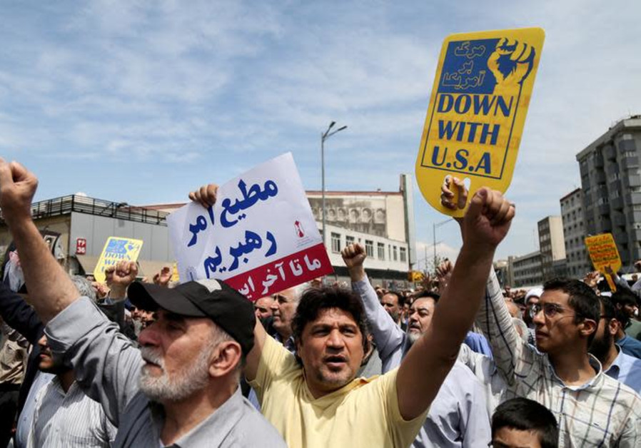 Iranians shout slogans during a protest in Tehran, Iran, against President Donald Trump, May 11, 2018 Photo By: REUTERS/TASNIM NEWS AGENCY Iranians shout slogans during a protest in Tehran, Iran, against President Donald Trump