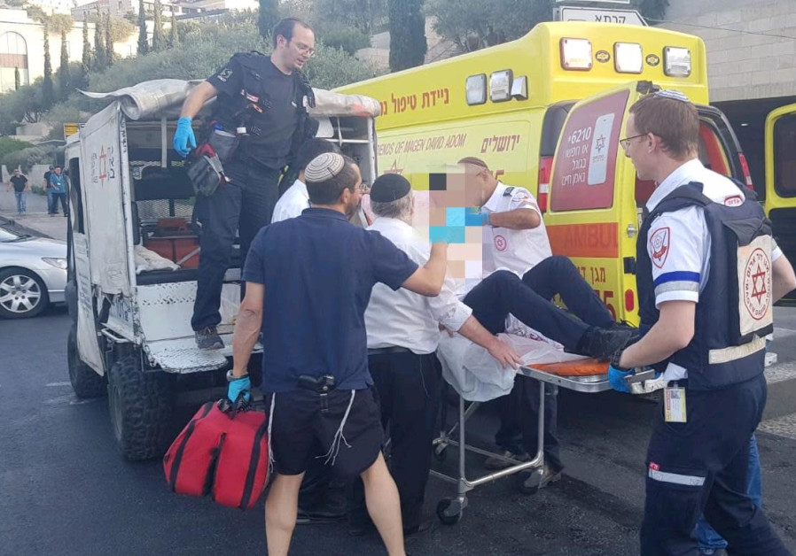 MDA paramedics evacuate a wounded man after he was stabbed in the Old City. Photo By: MDA Two injured in stabbing attack in Jerusalem's Old City