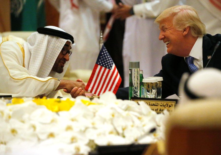 US President Donald Trump shakes hands with Abu Dhabi Crown Prince and Deputy Supreme Commander of the United Arab Emirates Armed Forces Mohammed bin Zayed al-Nahayan as he sits down to a meeting with of Gulf Cooperation Council leaders during their summit in Riyadh, Saudi Arabia Photo By: JONATHAN ERNST / REUTERS donald trump visits riyadh