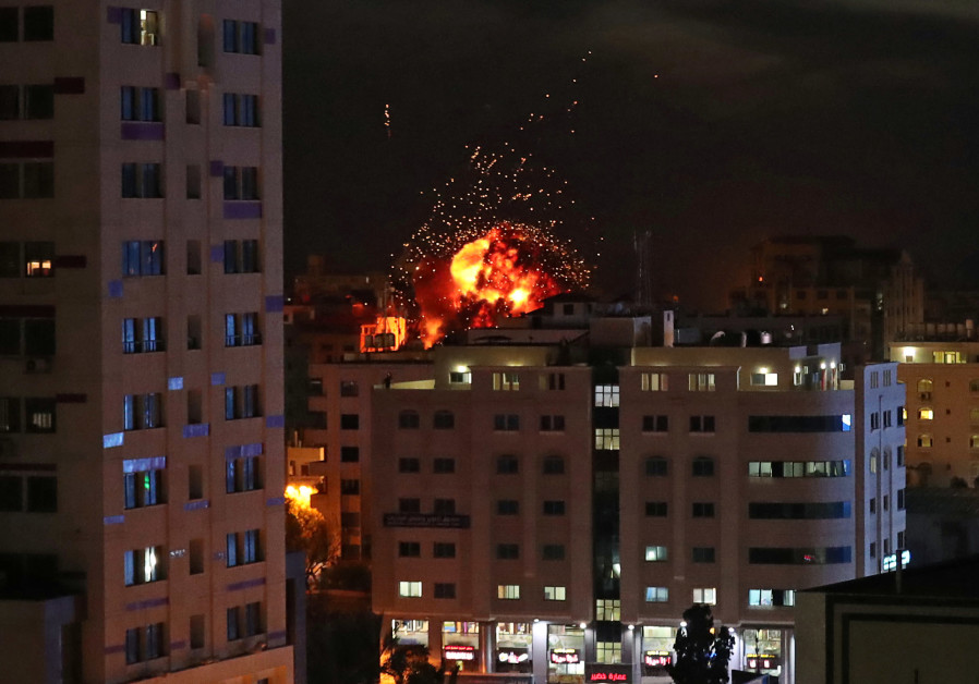 A ball of fire is seen during an Israeli air strike in Gaza City May 4, 2019. Photo By: SUHAIB SALEM / REUTERS A ball of fire is seen during an Israeli air strike in Gaza City May 4, 2019