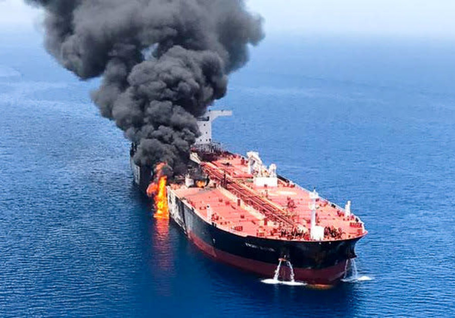 An oil tanker is seen after it was attacked at the Gulf of Oman, June 13, 2019 Photo By: ISNA/REUTERS An oil tanker is seen after it was attacked at the Gulf of Oman, June 13, 2019