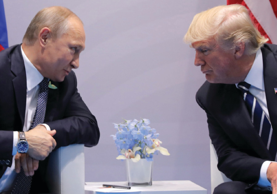 Russia’s President Vladimir Putin faces off with US President Donald Trump at the G20 summit in Hamburg on July 7, 2017 Photo By: CARLOS BARRIA / REUTERS Russia’s President Vladimir Putin faces off with US President Donald Trump at the G20 summit in Hamb