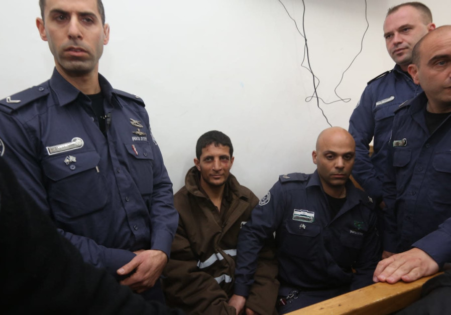 Arafat Irfaiya, Ori Ansbacher's murderer, brought to court Photo By: MARC ISRAEL SELLEM/THE JERUSALEM POST Arafat Irfaiya, Ori Ansbacher's murderer, brought to court