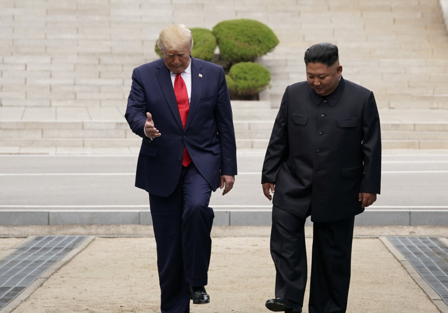 U.S. President Donald Trump meets with North Korean leader Kim Jong Un at the demilitarized zone separating the two Koreas, in Panmunjom, South Korea, June 30, 2019 Photo By: KEVIN LAMARQUE/REUTERS U.S. President Donald Trump meets with North Korean leader Kim Jong Un at the demilitarized zone sep