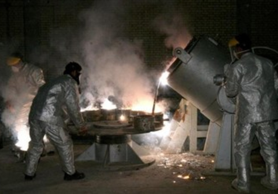 Iranian technicians work at a uranium processing site in Isfahan. Photo By: REUTERS Iran nuclear deal