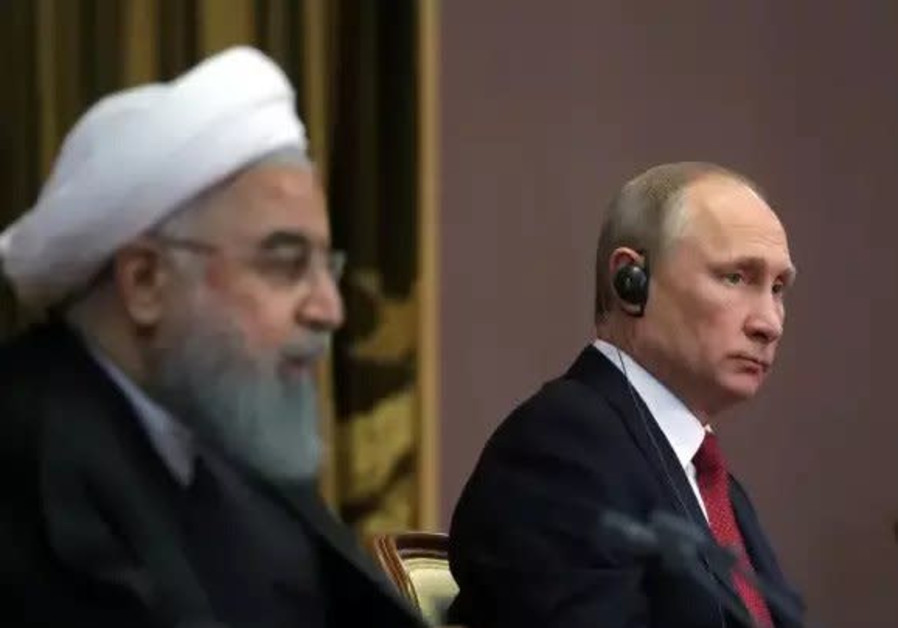 Iran's President Hassan Rouhani together with Russia's Vladimir Putin attend a joint news conference following their meeting in Sochi, Russia November 22, 2017 Photo By: SPUTNIK/MIKHAIL KLIMENTYEV/KREMLIN VIA REUTERS Iran's President Hassan Rouhani together with Russia's Vladimir Putin attend a joint conference