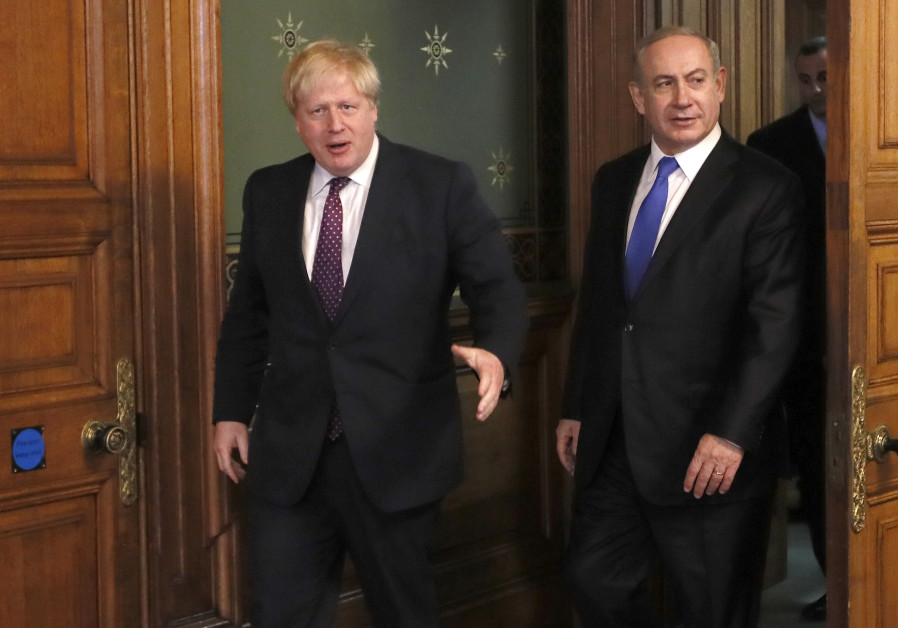 Britain's Foreign Secretary Boris Johnson (L) greets Israel's Prime Minister Benjamin Netanyahu at the Foreign Office in London, February 6, 2017 Photo By: REUTERS/KIRSTY WIGGLESWORTH/POOL Strong Israel supporter, but London has lost some foreign policy clout