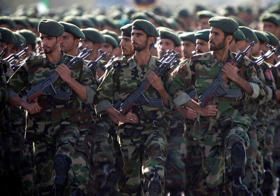 Members of Iran's Revolutionary Guards march during a military parade to commemorate the 1980-88 Iran-Iraq war in Tehran Photo By: MORTEZA NIKOUBAZI/ REUTERS Members of Iran's Revolutionary Guards march during a military parade to commemorate the 1980-88 Ira