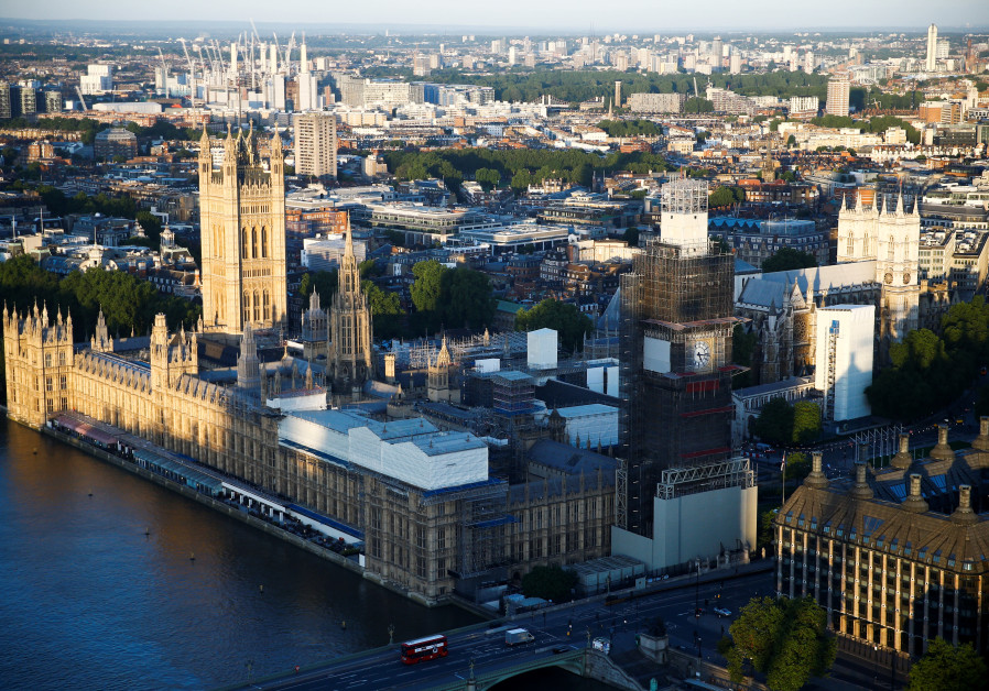 The Houses of Parliament can be seen during sunrise on the day of the Summer Solstice, seen from atop the London Eye, in London, Britain June 21, 2019 Photo By: REUTERS/HENRY NICHOLLS The Houses of Parliament can be seen during sunrise on the day of the Summer Solstice, seen from ato