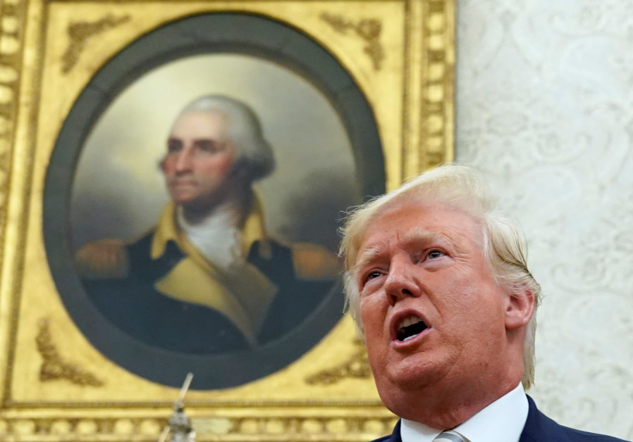 With a painting of George Washington in the background, U.S. President Donald Trump speaks during his meeting with Romania's President Klaus Iohannis in the Oval Office of the White House in Washington, U.S. August 20, 2019 Photo By: KEVIN LAMARQUE/REUTERS American Jews decry Trump's comments on 'disloyalty'