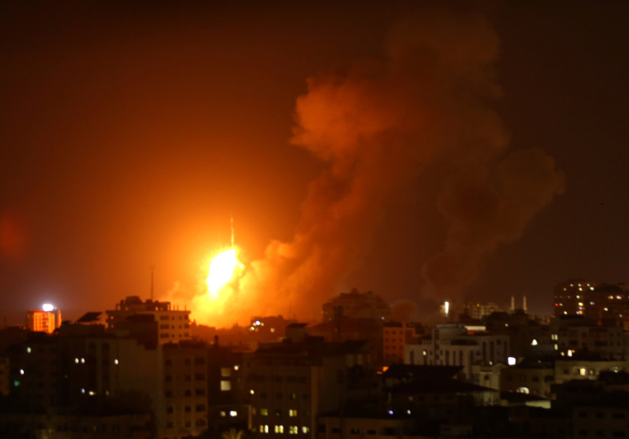 An explosion is seen during an Israeli air strike in Gaza City August 8, 2018. Photo By: STRINGER/ REUTERS An explosion is seen during an Israeli air strike in Gaza City August 8, 2018.