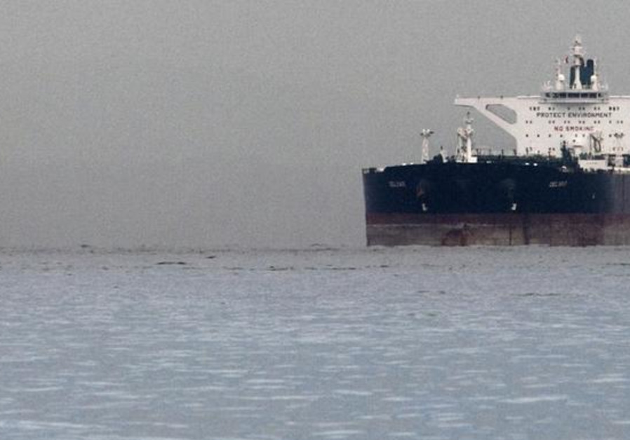 Malta-flagged Iranian crude oil supertanker "Delvar" is seen anchored off Singapore March 1, 2012. Western trade sanctions against Iran are strangling its oil exports even before they go into effect, a U.S. advisory body has found, amid warnings that any shortages will only push up crude prices and Photo By: REUTERS/TIM CHONG Malta-flagged Iranian crude oil supertanker "Delvar" is seen anchored off Singapore March 1, 2012.