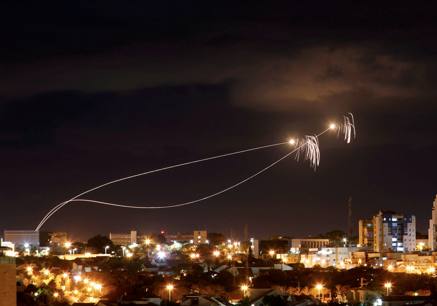 Iron Dome anti-missile system fires interception missiles as rockets are launched from Gaza towards Israel as seen from the city of Ashkelon, Israel October 27, 2018. Picture taken with long exposure Photo By: AMIR COHEN/REUTERS Iron Dome anti-missile system fires interception missiles as rockets are launched from Gaza