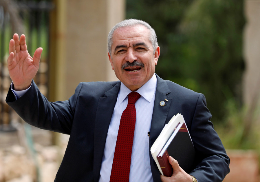 PA Prime Minister Mohammad Shtayyeh gestures as he arrives for a cabinet meeting of the new Palestinian government, in Ramallah, April 15, 2019 Photo By: MOHAMAD TOROKMAN/REUTERS PA Prime Minister Mohammad Shtayyeh in Ramallah, April 15, 2019