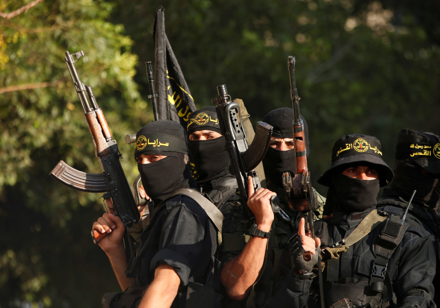 Palestinian Islamic Jihad militants participate in a military show in Gaza City Photo By: MOHAMMED SALEM/ REUTERS Palestinian Islamic Jihad militants participate in a military show in Gaza City