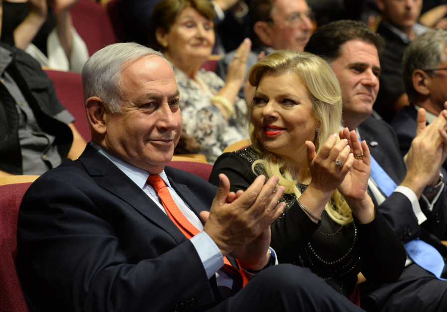Prime Minister Benjamin Netanyahu and his wife, Sara Netanyahu, at the Jerusalem Theater Photo By: CHAIM TZACH/GPO Prime Minister Benjamin Netanyahu and his wife, Sara Netanyahu, at the Jerusalem Theater