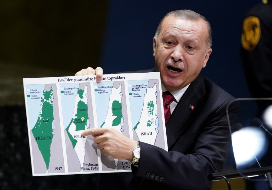 Turkey's President Recep Tayyip Erdogan holds up a map as he addresses the 74th session of the United Nations General Assembly at U.N. headquarters in New York City, New York, U.S., September 24, 2019 Photo By: REUTERS/CARLO ALLEGRI Turkey's Erdogan: Israel was originally mostly Palestinian