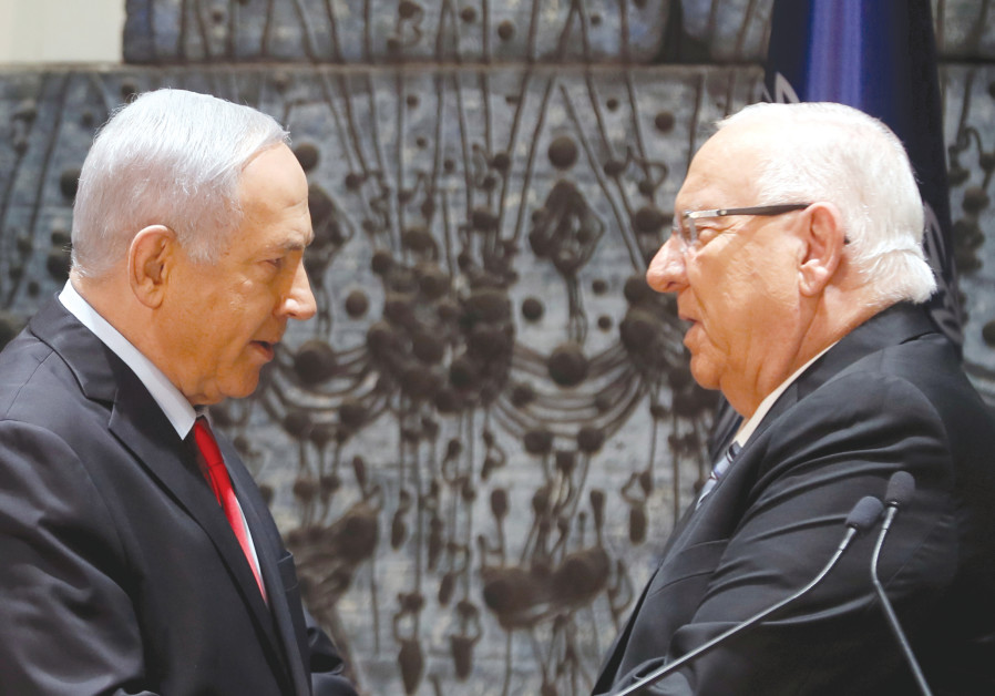 PRESIDENT REUVEN Rivlin and Prime Minister Benjamin Netanyahu face off at the President’s residence in Jerusalem on Wednesday night Photo By: RONEN ZVULUN/REUTERS PRESIDENT REUVEN Rivlin and Prime Minister Benjamin Netanyahu face off at the President’s residence