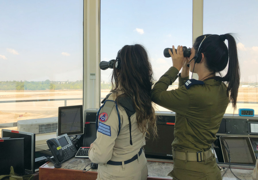 SEC.-LT. Yuval Yanovsky and Sgt. Gil Katzir on shift at the Hatzor Air Force Base. Photo By: ANNA AHRONHEIM SEC.-LT. Yuval Yanovsky and Sgt. Gil Katzir on shift at the Hatzor Air Force Base.