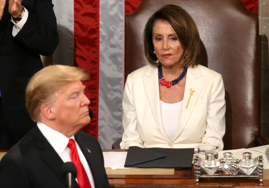 Speaker of the House Nancy Pelosi (D-CA) reacts alongside Vice President Mike Pence as he applauds U.S. President Donald Trump during his second State of the Union address to a joint session of the U.S. Congress in the House Chamber of the U.S. Capitol on Capitol Hill in Washington, U.S. February 5, Photo By: LEAH MILLIS/REUTERS U.S. diplomat at center of Trump-Ukraine affair to meet with House committee staff