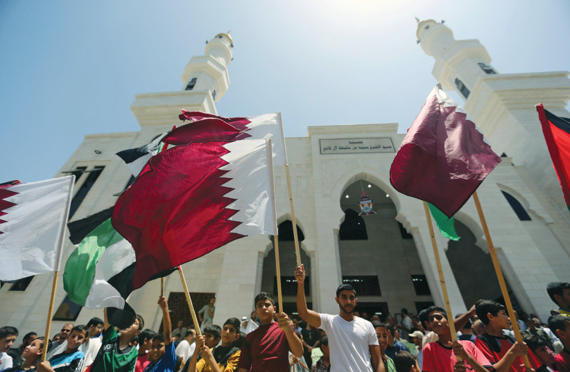 PALESTINIANS TAKE part in a rally in support of Qatar, inside Qatari-funded construction project ‘Hamad City,’ in the southern Gaza Strip. (credit: IBRAHEEM ABU MUSTAFA/REUTERS) PALESTINIANS TAKE part in a rally in support of Qatar, inside Qatari-funded construction project ‘Hamad City,’ in the southern Gaza Strip. (credit: IBRAHEEM ABU MUSTAFA/REUTERS)