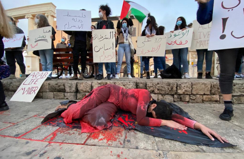 A protest against the rising crime and violence in the Arab sector in Israel, Jaffa, Saturday, February 6, 2021. (credit: SASSONI AVSHALOM) A protest against the rising crime and violence in the Arab sector in Israel, Jaffa, Saturday, February 6, 2021. (credit: SASSONI AVSHALOM)