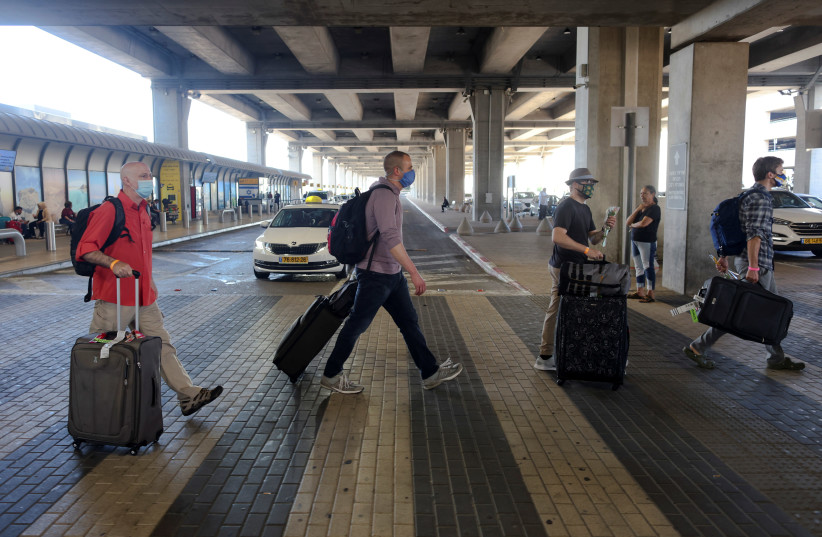 ourists walk at the Ben Gurion International Airport after entering Israel by plane, as coronavirus disease (COVID-19) restrictions ease, in Lod, near Tel Aviv, Israel (credit: RONEN ZVULUN/ REURERS) ourists walk at the Ben Gurion International Airport after entering Israel by plane, as coronavirus disease (COVID-19) restrictions ease, in Lod, near Tel Aviv, Israel (credit: RONEN ZVULUN/ REURERS)