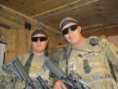 Eric Roberson with his battle buddy, Scott Yi. The two prepared to die together as they huddled in a bunker while rockets exploded around them. Photo courtesy of the author.