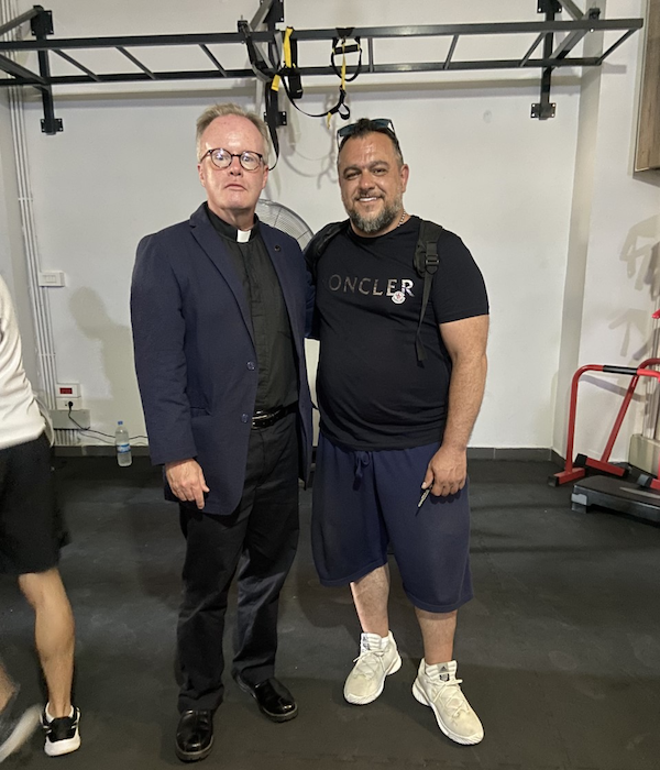 Father Benedict Kiely with Joe, owner of Grizzly Gym, Beirut, Lebanon, badly damaged by bomb blast in 2021 - helped by Nasarean to support 9 employees