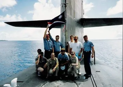 Members of the sonar division, including David Chetlain, kneeling in pink Chuck Taylor All Star Converse shoes. Photo courtesy of the author.