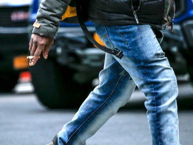 NEW YORK, NY - JANUARY 24: Detail of a man smoking a cigarette as he walks in Manhattan on January 24, 2018 in New York. American Lung Association released annual tobacco report that says tobacco use continues to be the number one cause of preventable death in the United States, killing 480,000 people every year.(Photo by Kena Betancur/VIEWpress/Corbis via Getty Images)