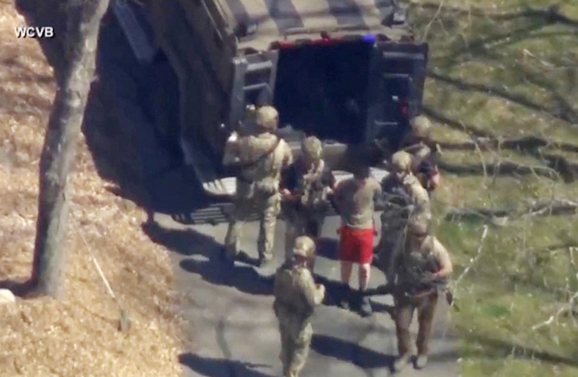 FBI agents arrest Jack Teixeira, an employee of the US Air Force National Guard, in connection with an investigation into the leaks online of classified U.S. documents, outside a residence in this still image taken from video in North Dighton, Massachusetts, US, April 13, 2023. (credit: WCVB-TV VIA ABC VIA REUTERS) FBI agents arrest Jack Teixeira, an employee of the US Air Force National Guard, in connection with an investigation into the leaks online of classified U.S. documents, outside a residence in this still image taken from video in North Dighton, Massachusetts, US, April 13, 2023. (credit: WCVB-TV VIA ABC VIA REUTERS)