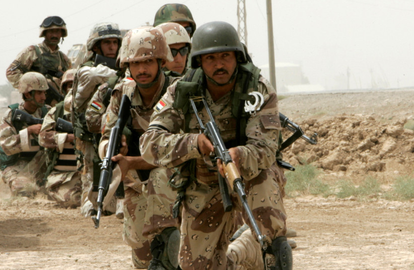 Iraqi soldiers conduct a search operation in the town of Khan Bani Saad, north of Baghdad, Iraq, August 1, 2008. (credit: REUTERS/THAIER AL-SUDANI/FILE PHOTO) Iraqi soldiers conduct a search operation in the town of Khan Bani Saad, north of Baghdad, Iraq, August 1, 2008. (credit: REUTERS/THAIER AL-SUDANI/FILE PHOTO)