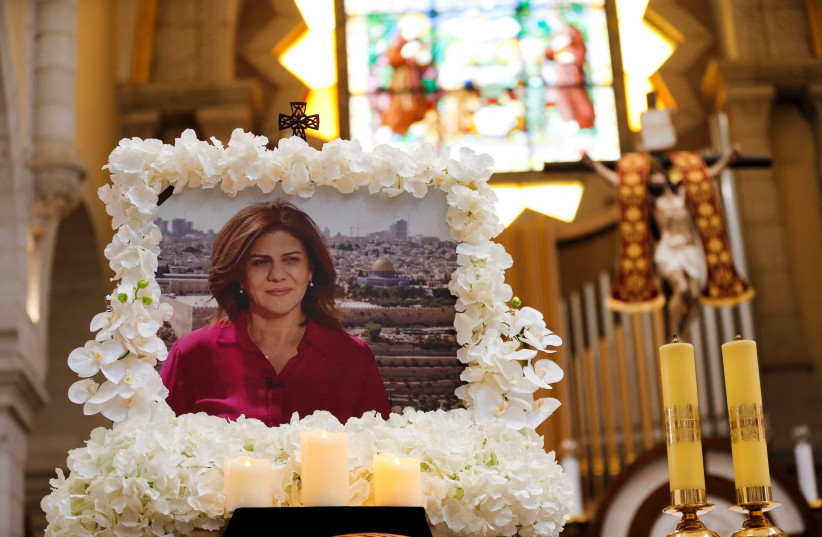 A portrait of Al Jazeera journalist Shireen Abu Akleh, who was killed during an Israeli raid, is displayed during a special mass in her memory in the Church of the Nativity in Bethlehem, in the West Bank, May 16, 2022. (credit: MUSSA QAWASMA/REUTERS) A portrait of Al Jazeera journalist Shireen Abu Akleh, who was killed during an Israeli raid, is displayed during a special mass in her memory in the Church of the Nativity in Bethlehem, in the West Bank, May 16, 2022. (credit: MUSSA QAWASMA/REUTERS)