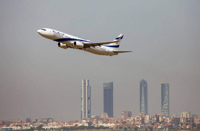 An El Al Israel Airlines Boeing 737-900ER airplane takes off from the Adolfo Suarez Madrid-Barajas airport as seen from Paracuellos del Jarama, outside Madrid, Spain, August 8, 2018 (credit: REUTERS/PAUL HANNA) An El Al Israel Airlines Boeing 737-900ER airplane takes off from the Adolfo Suarez Madrid-Barajas airport as seen from Paracuellos del Jarama, outside Madrid, Spain, August 8, 2018 (credit: REUTERS/PAUL HANNA)