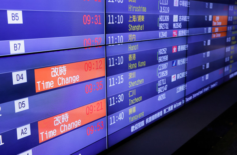 Time change is showed on a fight information board, as China's no fly and no shipping zone comes into force in East China Sea to the north of Taiwan, at Taoyuan International airport in Taoyuan, Taiwan April 16, 2023. (credit: REUTERS/ANN WANG) Time change is showed on a fight information board, as China's no fly and no shipping zone comes into force in East China Sea to the north of Taiwan, at Taoyuan International airport in Taoyuan, Taiwan April 16, 2023. (credit: REUTERS/ANN WANG)