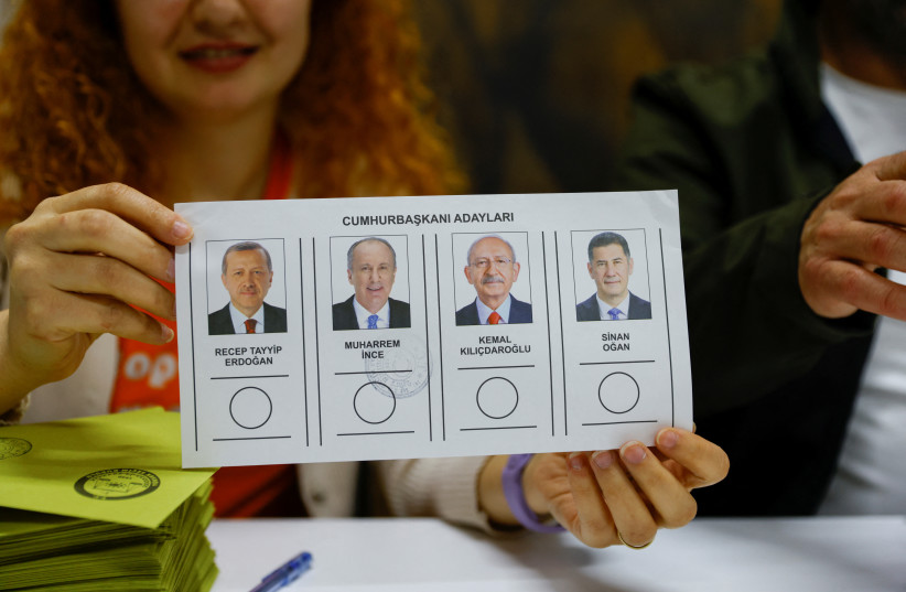 A person holds the ballot at a polling station during the presidential and parliamentary elections, in Istanbul, Turkey May 14, 2023. (credit: REUTERS/KEMAL ASLAN) A person holds the ballot at a polling station during the presidential and parliamentary elections, in Istanbul, Turkey May 14, 2023. (credit: REUTERS/KEMAL ASLAN)