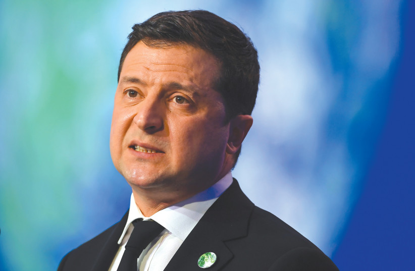 UKRAINE’S PRESIDENT Volodymyr Zelensky, dressed in a suit in pre-war days: ‘a leader whose display of courage, patriotism and selflessness defied an era of political cynicism, egotism and cowardice.’ (credit: Andy Buchanan/Pool/via Reuters) UKRAINE’S PRESIDENT Volodymyr Zelensky, dressed in a suit in pre-war days: ‘a leader whose display of courage, patriotism and selflessness defied an era of political cynicism, egotism and cowardice.’ (credit: Andy Buchanan/Pool/via Reuters)