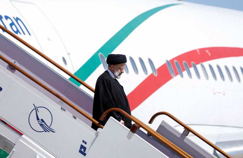Iranian President Ebrahim Raisi disembarks from a plane upon arrival at Damascus airport, Syria May 3, 2023. (credit: YAMAM AL SHAAR/REUTERS) Iranian President Ebrahim Raisi disembarks from a plane upon arrival at Damascus airport, Syria May 3, 2023. (credit: YAMAM AL SHAAR/REUTERS)