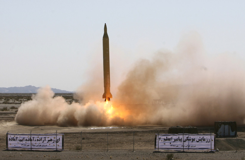 A Ghadr 1 class Shahab 3 long range missile is prepared for launch during a test from an unknown location in central Iran (credit: REUTERS) A Ghadr 1 class Shahab 3 long range missile is prepared for launch during a test from an unknown location in central Iran (credit: REUTERS)
