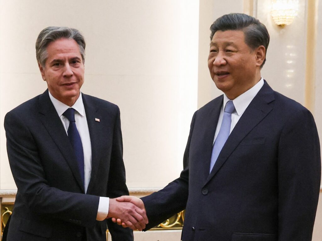 TOPSHOT - US Secretary of State Antony Blinken (L) shakes hands with China's President Xi Jinping at the Great Hall of the People in Beijing on June 19, 2023. President Xi Jinping hosted Antony Blinken for talks in Beijing on June 19, capping two days of high-level talks by the US secretary of state with Chinese officials. (Photo by Leah MILLIS / POOL / AFP) (Photo by LEAH MILLIS/POOL/AFP via Getty Images)