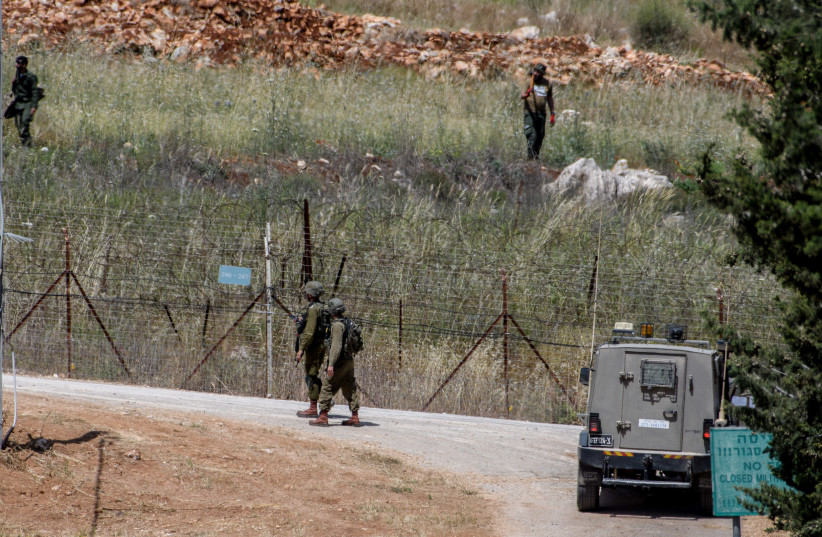 Israeli soldiers guard the northern Israeli border with Lebanon, while Lebanese soldiers work on their side of the border, on May 16, 2023. (credit: AYAL MARGOLIN/FLASH90) Israeli soldiers guard the northern Israeli border with Lebanon, while Lebanese soldiers work on their side of the border, on May 16, 2023. (credit: AYAL MARGOLIN/FLASH90)