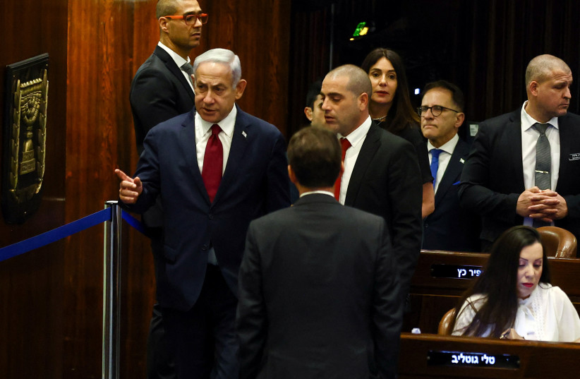 Prime Minister Benjamin Netanyahu gestures before he casts his vote as the Knesset elects its two members to the Judicial Selection Committee on June 14, 2023 (credit: RONEN ZVULUN/REUTERS) Prime Minister Benjamin Netanyahu gestures before he casts his vote as the Knesset elects its two members to the Judicial Selection Committee on June 14, 2023 (credit: RONEN ZVULUN/REUTERS)