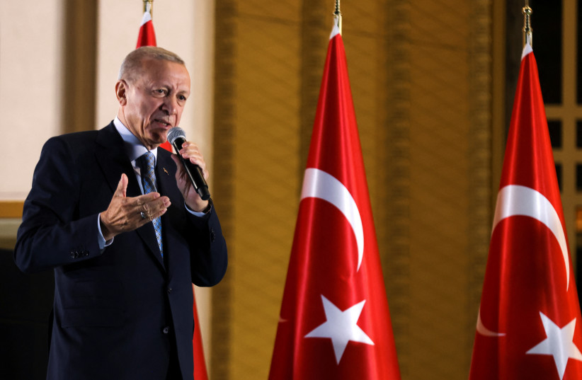 Turkish President Recep Tayyip Erdogan addresses his supporters following his victory in the second round of the presidential election at the Presidential Palace in Ankara, Turkey May 29, 2023. (credit: UMIT BEKTAS/REUTERS) Turkish President Recep Tayyip Erdogan addresses his supporters following his victory in the second round of the presidential election at the Presidential Palace in Ankara, Turkey May 29, 2023. (credit: UMIT BEKTAS/REUTERS)