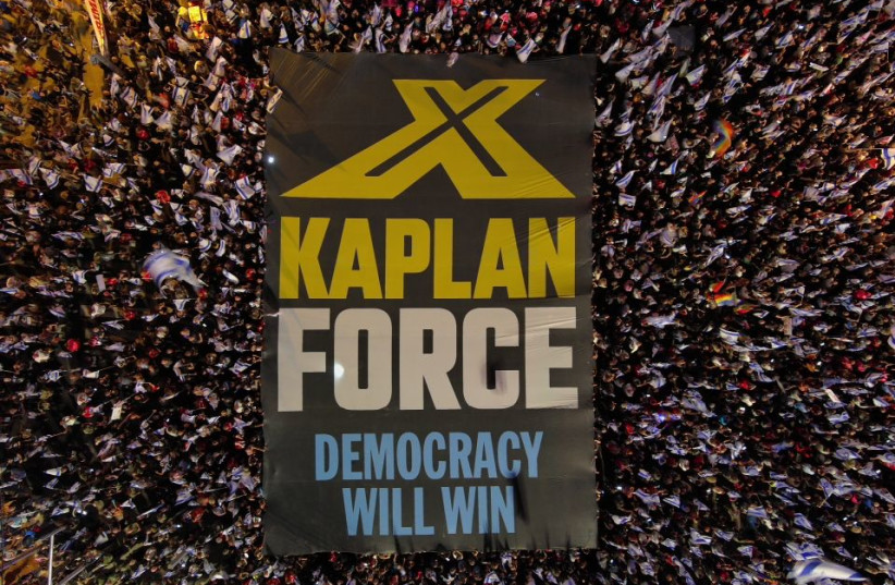 Demonstrators, including the ''Kaplan Force,'' protest against the Israeli government's judicial reform in Dizengoff Square, Tel Aviv in the 25th week of protests June 24, 2023. (credit: YAIR PALTI) Demonstrators, including the ''Kaplan Force,'' protest against the Israeli government's judicial reform in Dizengoff Square, Tel Aviv in the 25th week of protests June 24, 2023. (credit: YAIR PALTI)