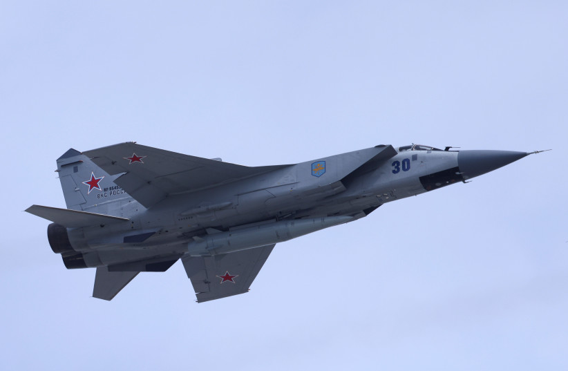 A Russian MiG-31 fighter jet equipped with a Kinzhal hypersonic missile flies over Red Square during a rehearsal for a flypast, part of a military parade marking the anniversary of the victory over Nazi Germany in World War Two, in central Moscow, Russia May 7, 2022. (credit: REUTERS/MAXIM SHEMETOV) A Russian MiG-31 fighter jet equipped with a Kinzhal hypersonic missile flies over Red Square during a rehearsal for a flypast, part of a military parade marking the anniversary of the victory over Nazi Germany in World War Two, in central Moscow, Russia May 7, 2022. (credit: REUTERS/MAXIM SHEMETOV)