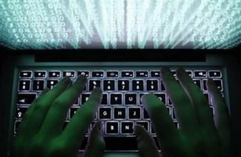 Cyber Hackers (credit: REUTERS) Cyber Hackers (credit: REUTERS)