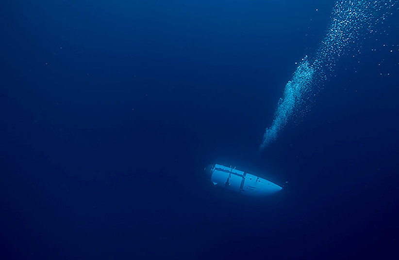 The Titan submersible, operated by OceanGate Expeditions to explore the wreckage of the sunken SS Titanic off the coast of Newfoundland, dives in an undated photograph (credit: OceanGate Expeditions/Handout via REUTERS) The Titan submersible, operated by OceanGate Expeditions to explore the wreckage of the sunken SS Titanic off the coast of Newfoundland, dives in an undated photograph (credit: OceanGate Expeditions/Handout via REUTERS)
