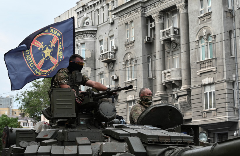 Fighters of Wagner private mercenary group stand on a tank outside a local circus near the headquarters of the Southern Military District in the city of Rostov-on-Don, Russia, June 24, 2023 (credit: REUTERS/STRINGER) Fighters of Wagner private mercenary group stand on a tank outside a local circus near the headquarters of the Southern Military District in the city of Rostov-on-Don, Russia, June 24, 2023 (credit: REUTERS/STRINGER)