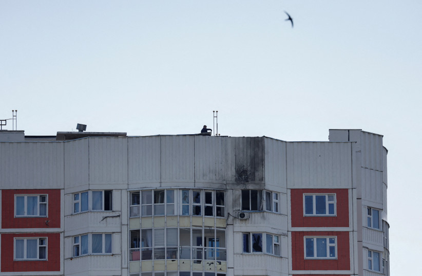 A view shows a damaged multi-storey apartment block following a reported drone attack in Moscow, Russia, May 30, 2023. (credit: REUTERS/MAXIM SHEMETOV) A view shows a damaged multi-storey apartment block following a reported drone attack in Moscow, Russia, May 30, 2023. (credit: REUTERS/MAXIM SHEMETOV)